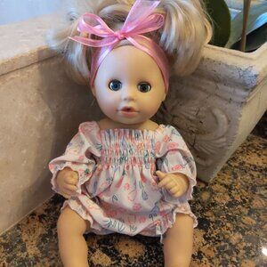 Götz Sleepy Aquini Girl Flower 13" Bath Baby Girl Doll with Blonde Hair to Wash